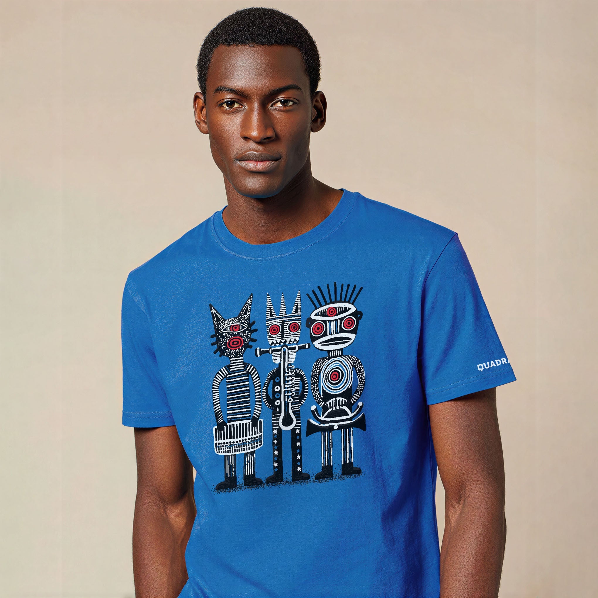 Model wearing the Tribal Musicians blue unisex graphic T-shirt by QUADRA GALLERY